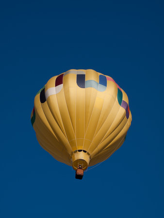 Hot air balloons in a field during a festival in Loveland, Colorado.のeditorial素材