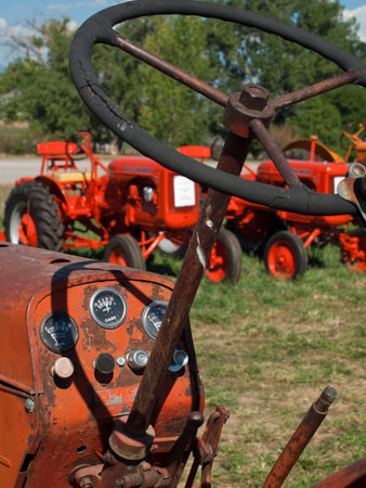 Old farm equipment on the display at the Yesteryear Farm Show in Longmont, Colorado.のeditorial素材