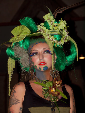 Wild floral arrangements at the White Roses for the Bride, Red Begonias for the Dictator
With a Floral Fashion Show by Arthur Williams, Babylon Floral Design in Denver Botanical Gardens 2011.のeditorial素材