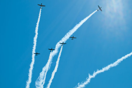 Vintage airplane flying in formation at the Rocky Mountain Airshow in Broomfield, Colorado.