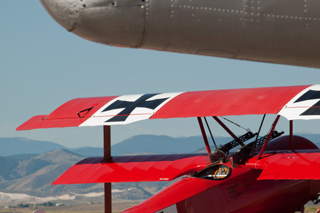 Old red biplane at the Rocky Mountain Airshow in Broomfield, Colorado.のeditorial素材