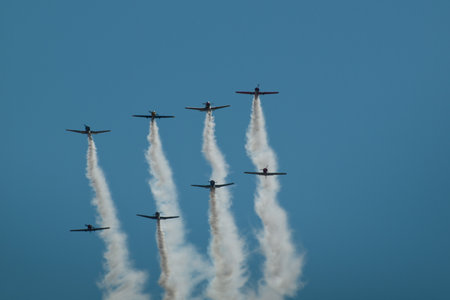 Vintage airplane flying in formation at the Rocky Mountain Airshow in Broomfield, Colorado.のeditorial素材