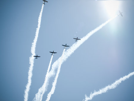 Vintage airplane flying in formation at the Rocky Mountain Airshow in Broomfield, Colorado.のeditorial素材