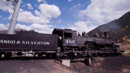 Steam locomotive engine. This train is in daily operation on the narrow gauge railroad between...