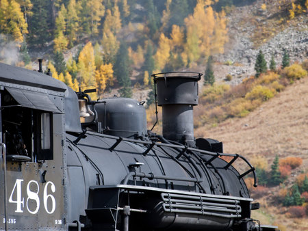 Steam locomotive engine. This train is in daily operation on the narrow gauge railroad between...