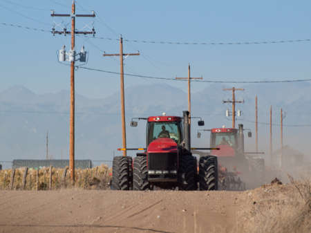 Farm machinery on the rural road in Colorado.の写真素材