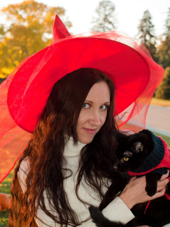 Young woman in autumn park.