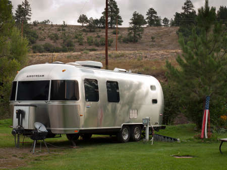 RV campsite at sunrise in Pagosa Springs, Colorado.のeditorial素材