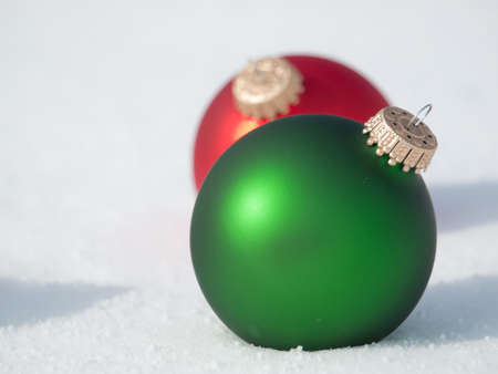 Christmas ornaments in virgin snow.の写真素材