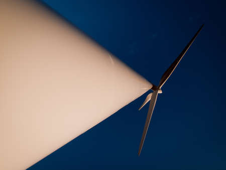 Wind turbines farm at sunset in Limon, Colorado.の写真素材
