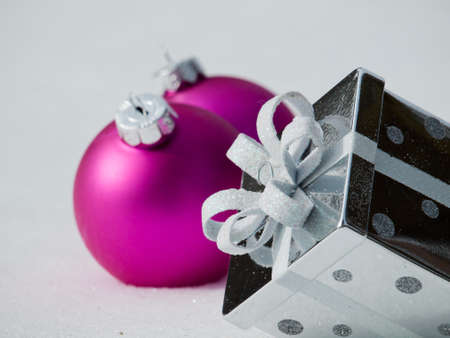 Christmas ornaments in virgin snow.の写真素材