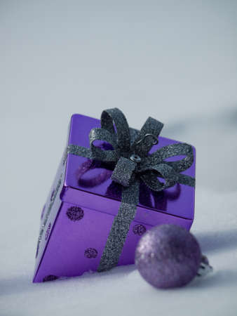 Christmas ornaments in virgin snow.の写真素材