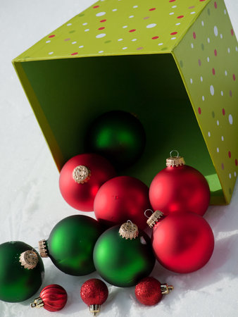 Christmas ornaments in virgin snow.