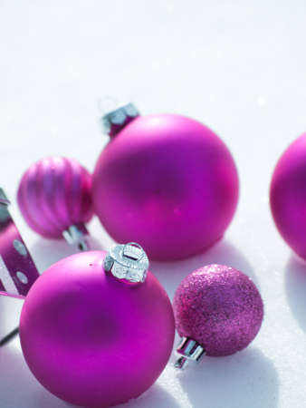 Christmas ornaments in virgin snow.の写真素材