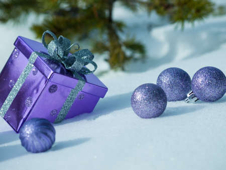 Christmas ornaments in virgin snow.の写真素材