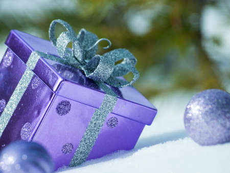 Christmas ornaments in virgin snow.の写真素材