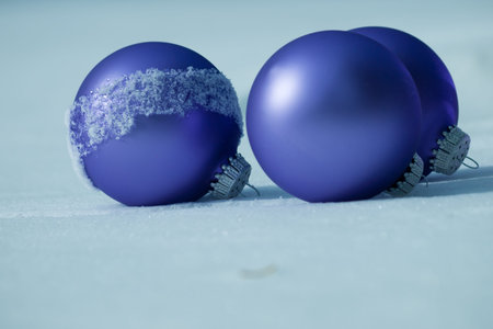 Christmas ornaments in virgin snow.の写真素材