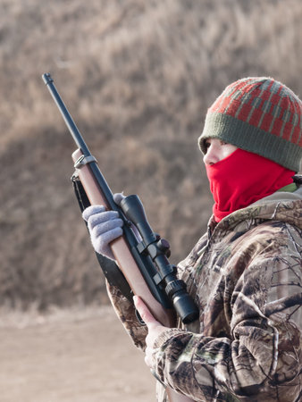 Young boy practicing rifle marksmanship at the Appleseed Project.の写真素材