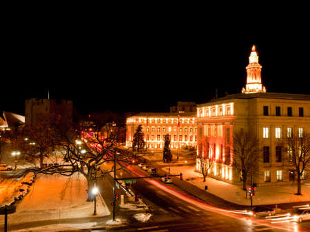 Downtown Denver at Christmas. Denver's City and County building decorated with holiday lights.のeditorial素材