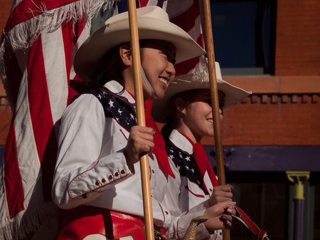 The 2012 National Western Stock Show Parade, travels up 17 Street in downtown Denver, Colorado.