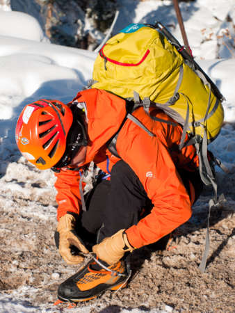 Ice climbers getting ready for a climb in Ice park, Ouray.のeditorial素材
