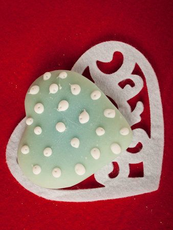 Cookies for Valentine's day on white plate.