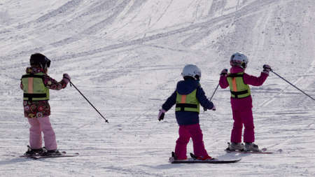 Little girls skiing at Vail, Colorado.のeditorial素材