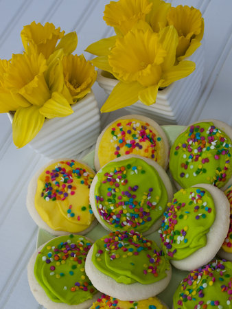 Easter cookies decorations with green and yellow icing.の写真素材