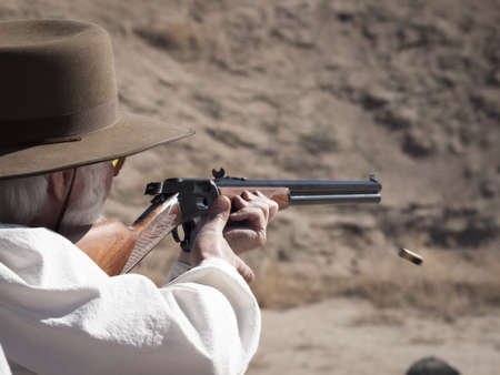 Cowboy Action Shooting Club. The firearms used are based on those which existed in the 19th century American West, i.e. lever action rifle, single action revolver, and shotgun.のeditorial素材