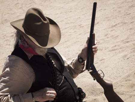 Cowboy Action Shooting Club. The firearms used are based on those which existed in the 19th century American West, i.e. lever action rifle, single action revolver, and shotgun.のeditorial素材