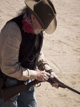 Cowboy Action Shooting Club. The firearms used are based on those which existed in the 19th century American West, i.e. lever action rifle, single action revolver, and shotgun.のeditorial素材