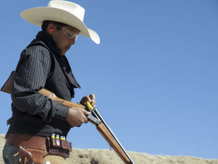 Cowboy Action Shooting Club. The firearms used are based on those which existed in the 19th century American West, i.e. lever action rifle, single action revolver, and shotgun.のeditorial素材