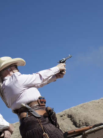 Cowboy Action Shooting Club. The firearms used are based on those which existed in the 19th century American West, i.e. lever action rifle, single action revolver, and shotgun.のeditorial素材