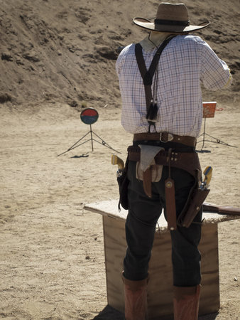 Cowboy Action Shooting Club. The firearms used are based on those which existed in the 19th century American West, i.e. lever action rifle, single action revolver, and shotgun.のeditorial素材