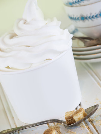 Cup of cheesecake frozen yogurt or soft serve ice cream.の写真素材
