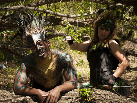 Birdlike people in spring forest.の写真素材