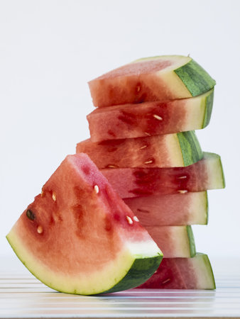 Fresh slices of watermelon on white background.