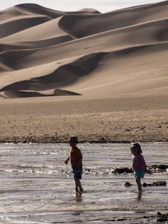Spring at Great Sand Dunes National Park, Colorado. Medano Creek flows around the base of the dunes in springtime.のeditorial素材