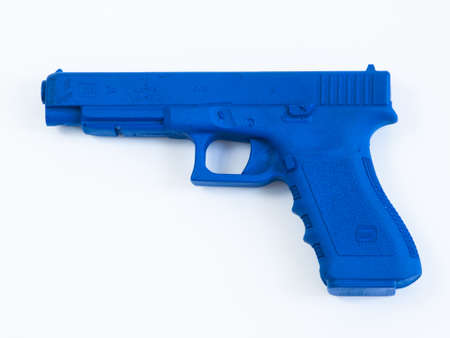 Training Glock 34 Blue Gun on white background.のeditorial素材