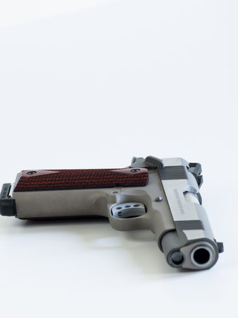Colt 1911 Commander is a single-action, semi-automatic, magazine-fed, and recoil-operated handgun based on the John M. Browning designed M1911. It was the first mass-produced pistol with an aluminium alloy frame and the first Colt pistol to be chambered iのeditorial素材