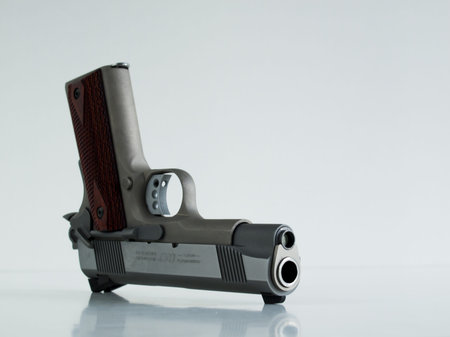 Colt 1911 Commander is a single-action, semi-automatic, magazine-fed, and recoil-operated handgun...