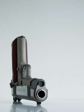 Colt 1911 Commander is a single-action, semi-automatic, magazine-fed, and recoil-operated handgun based on the John M. Browning designed M1911. It was the first mass-produced pistol with an aluminium alloy frame and the first Colt pistol to be chambered iのeditorial素材