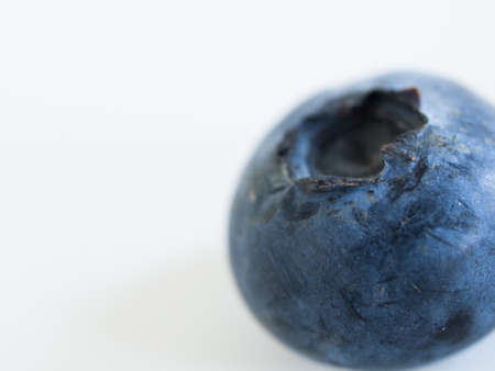 Fresh bluberries from local market on white background. Blueberries contain anthocyanins,  and various phytochemicals, which possibly have a role in reducing risks of some diseases.の写真素材