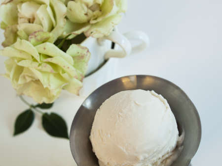 Scoop of delicious Italian fresh ice cream on white background.の写真素材