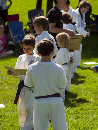 2012 J. W. Kim Tae Kwon Do school belt test in the park.のeditorial素材