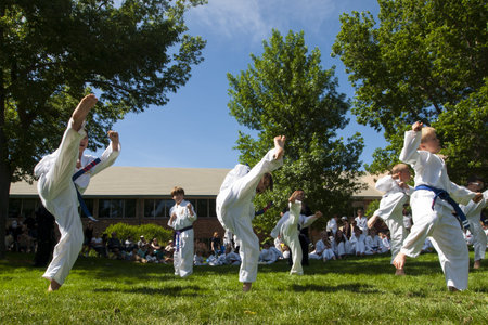 2012 J. W. Kim Tae Kwon Do school belt test in the park.のeditorial素材