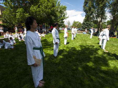 2012 J. W. Kim Tae Kwon Do school belt test in the park.のeditorial素材