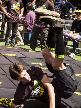 2012 Summer Teva Mountain Games in Vail, Colorado. Slacklining is defined as the act of balancing...