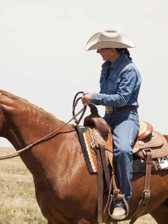 Horseback riders on a ranch in Colorado.のeditorial素材