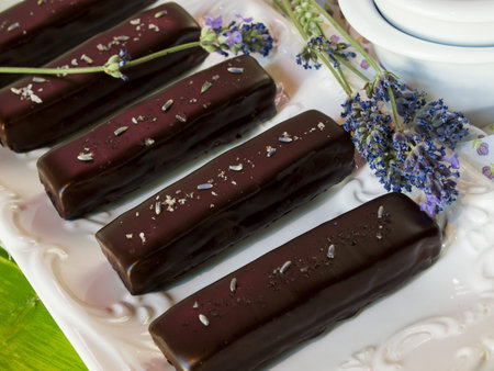 Gourmet lavender chocolate bars on white seving plate.の写真素材